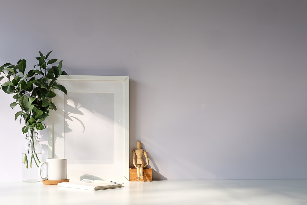 Mockup workspace desk and copy space books,plant and coffee on w